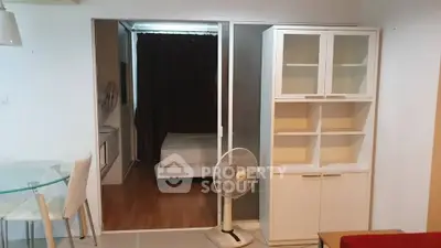 Cozy studio apartment with modern furniture and sliding partition