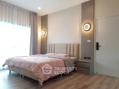 Modern bedroom with stylish lighting and cozy decor