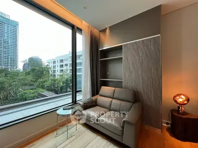 Modern living room with large window and stylish decor