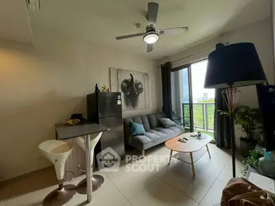 Modern living room with balcony view, featuring cozy sofa and stylish decor.