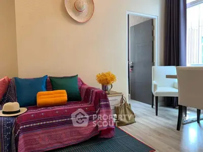 Charming living room with colorful decor and modern furniture, perfect for cozy living.
