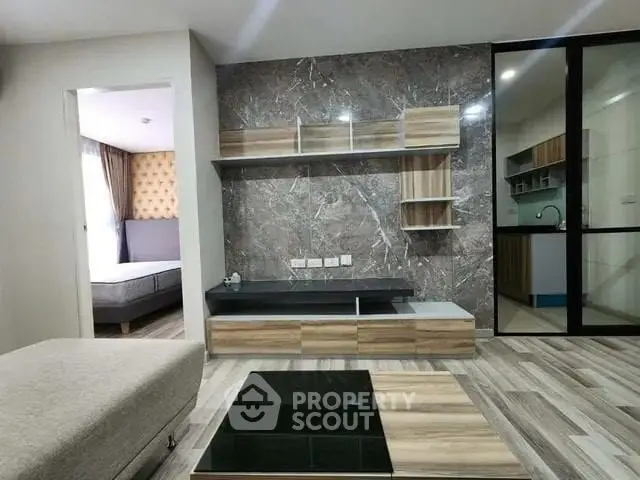 Modern living room with stylish decor and open kitchen layout