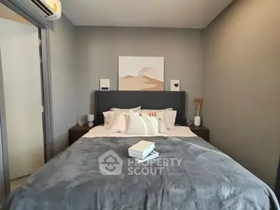 Cozy modern bedroom with stylish decor and plush bedding