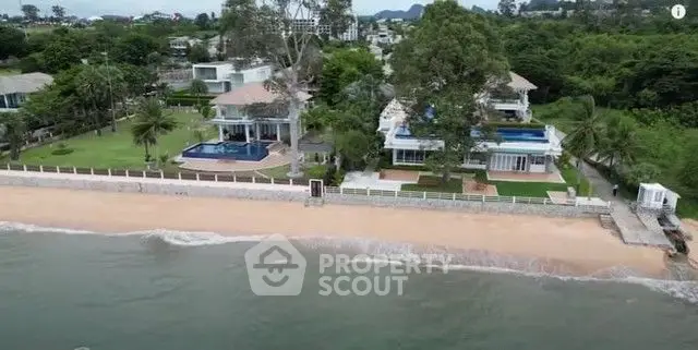 Luxurious beachfront villas with private pools and lush gardens