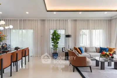 Luxurious modern living room with elegant decor and ample natural light