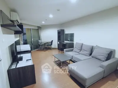 Spacious modern living room with sleek furniture and open layout