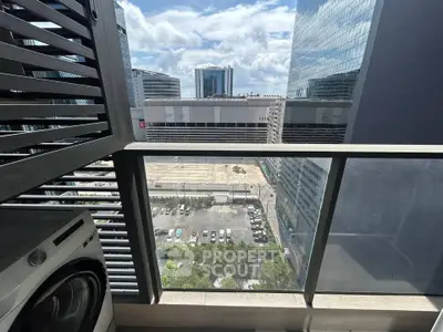 Modern balcony with city view and washing machine, perfect for urban living.