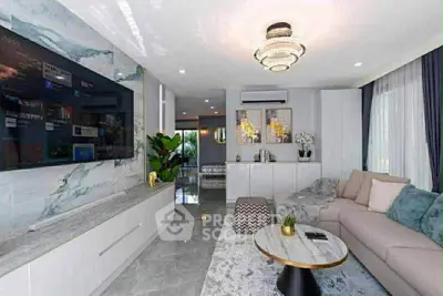 Luxurious modern living room with marble accents and stylish decor