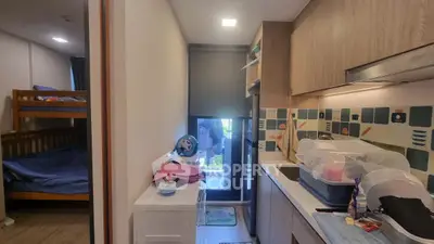 Cozy compact apartment with bunk beds and modern kitchen