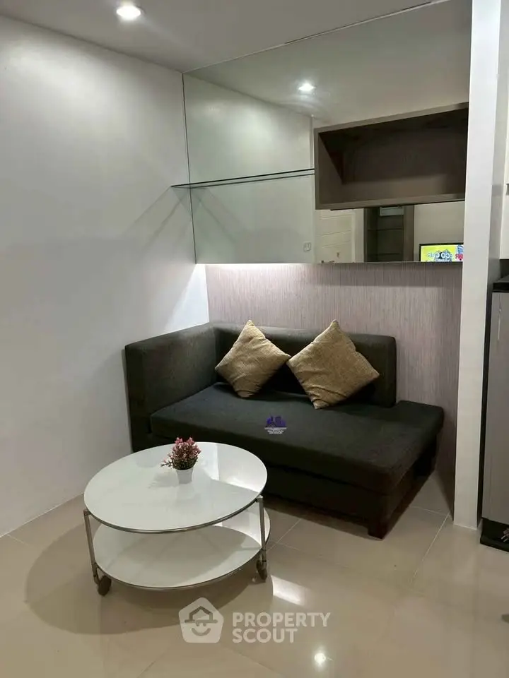 Cozy modern living room with sleek sofa and stylish coffee table