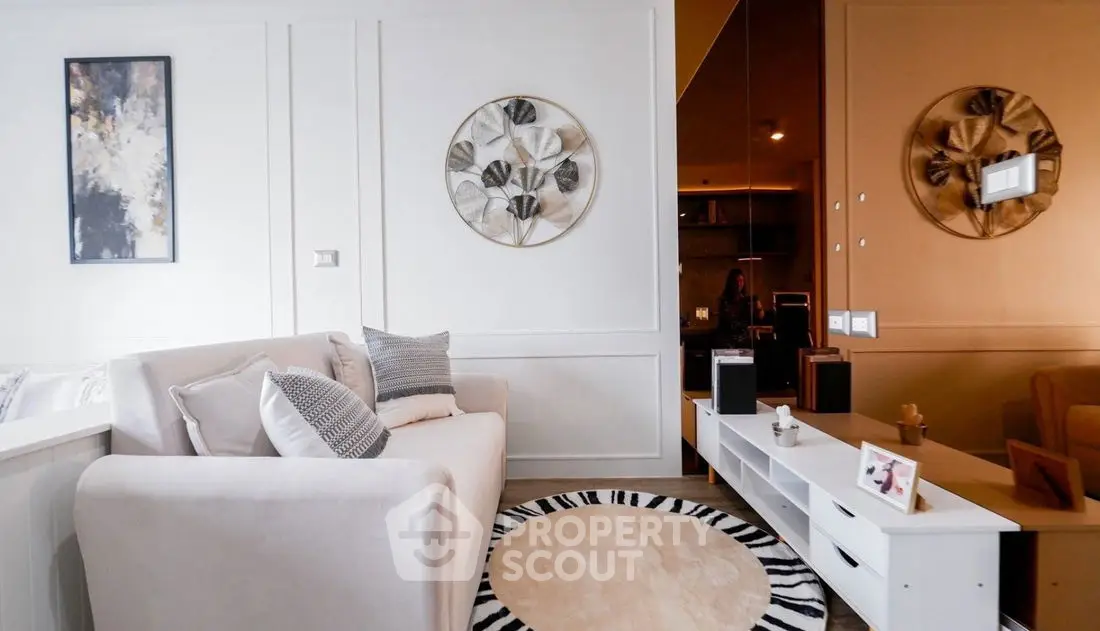 Stylish living room with modern decor and cozy seating area.
