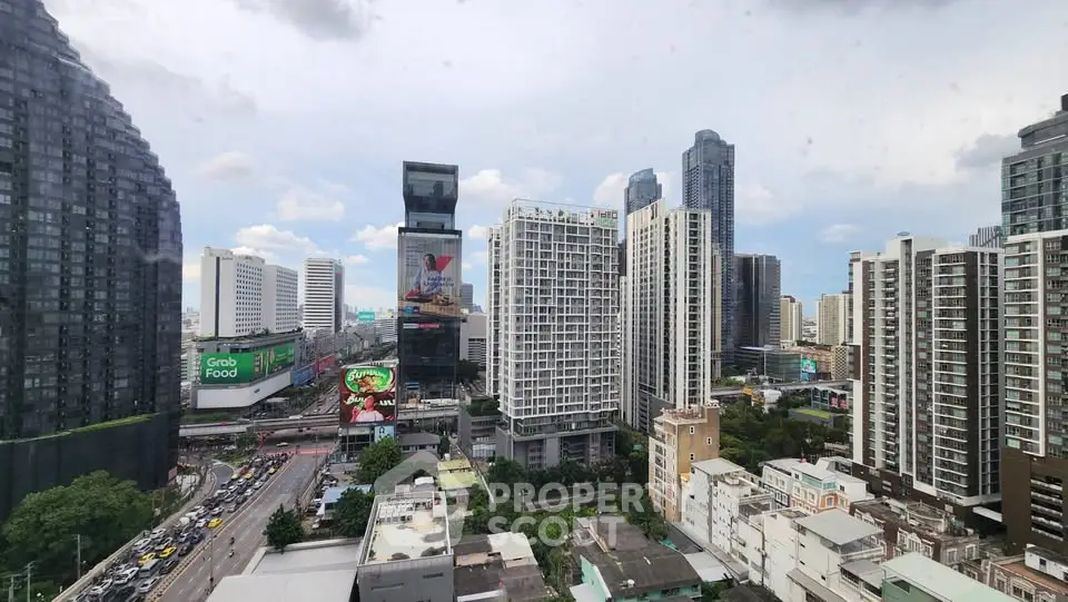 Stunning cityscape view showcasing modern high-rise buildings and vibrant urban life.