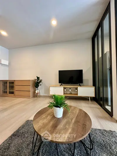 Modern living room with sleek furniture and stylish decor