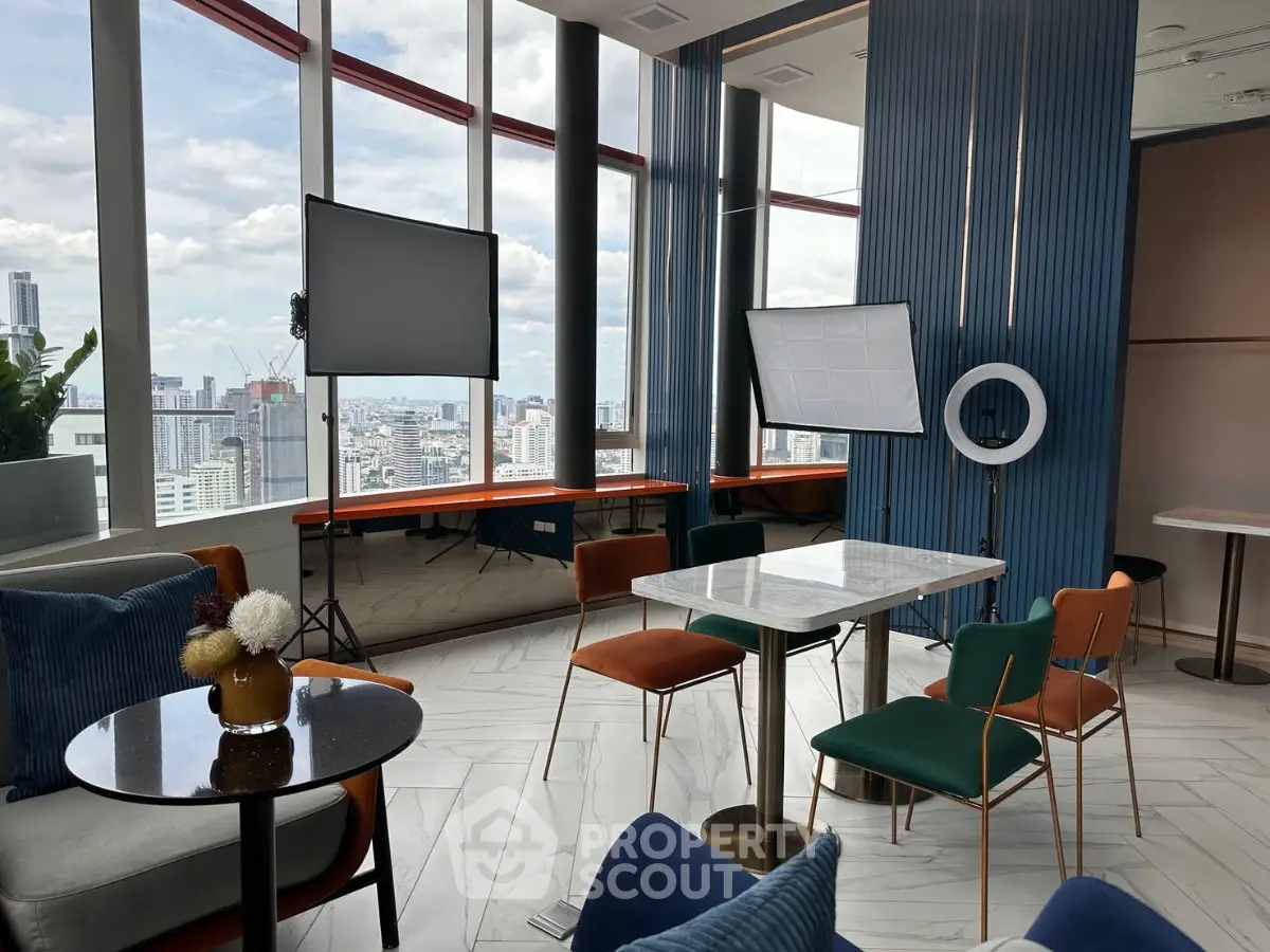 Stylish modern living room with panoramic city views and elegant furniture