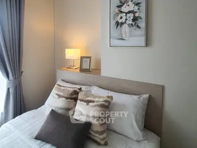 Cozy bedroom with elegant decor and soft lighting, perfect for relaxation.