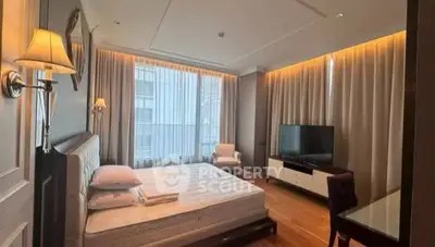 Luxurious bedroom with modern decor and large windows in upscale apartment