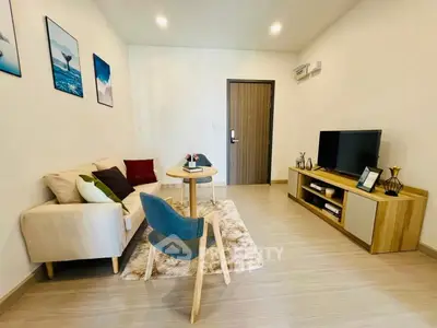 Modern living room with stylish furniture and cozy decor in a contemporary apartment.
