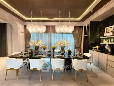 Luxurious dining room with elegant chandelier and modern decor