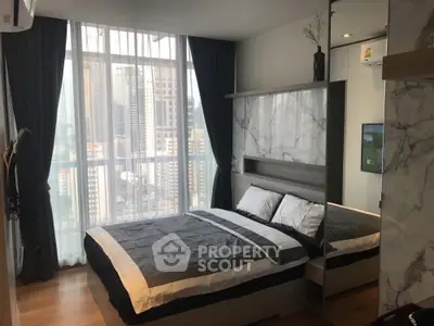 Modern bedroom with city view and elegant marble accents