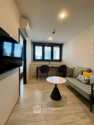 Modern living room with stylish decor and natural light