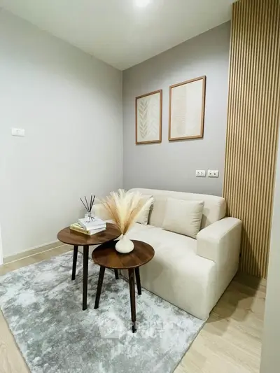 Cozy modern living room with neutral tones and stylish decor