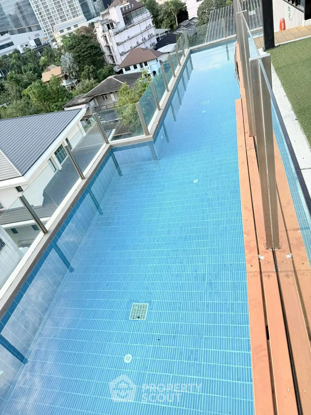 Stunning rooftop pool with city views, perfect for relaxation and leisure in a modern urban setting.