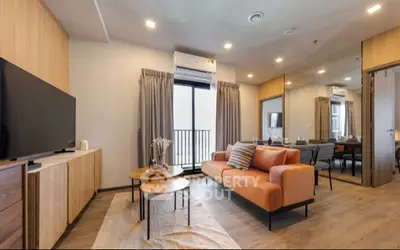 Spacious modern living room with elegant decor and ample natural light