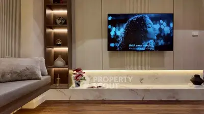 Stylish modern living room with built-in TV and elegant decor