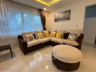 Cozy living room with stylish sofa and modern decor