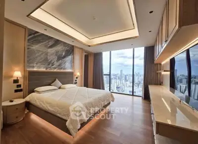 Luxurious bedroom with stunning city view and modern design