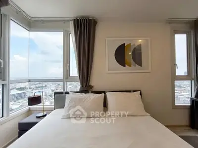 Modern bedroom with panoramic city view and stylish decor