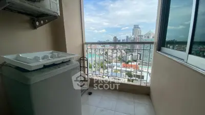 High-rise balcony with washing machine and stunning city view