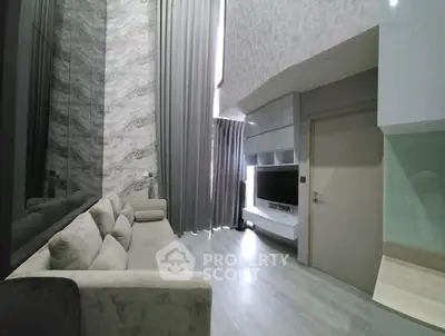 Modern living room with high ceilings and elegant decor