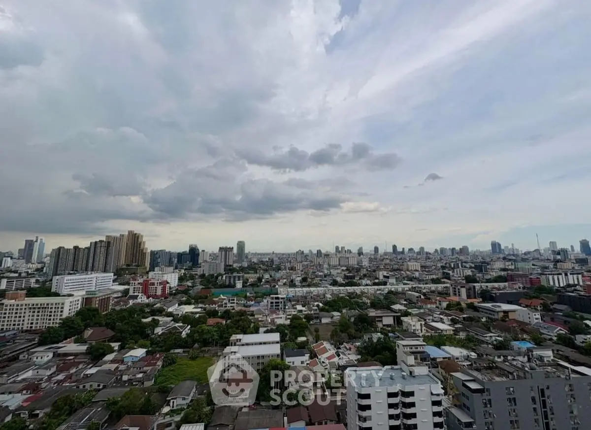 Stunning cityscape view from high-rise building showcasing urban skyline and expansive horizon.