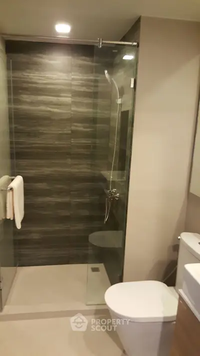 Modern bathroom with glass shower and sleek design