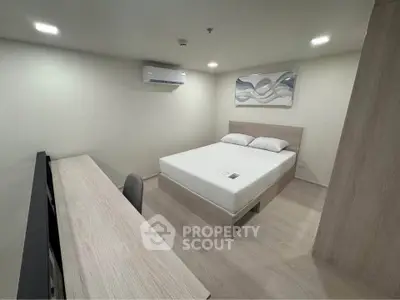 Modern minimalist bedroom with air conditioning and stylish decor