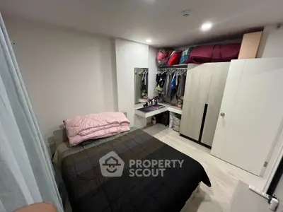 Cozy bedroom with modern wardrobe and organized storage space