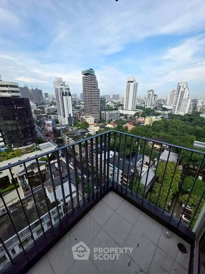 Stunning cityscape view from a high-rise balcony, perfect for urban living enthusiasts.