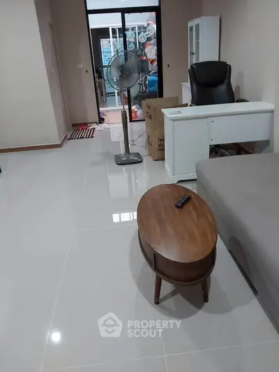 Spacious living room with modern furniture and sleek flooring