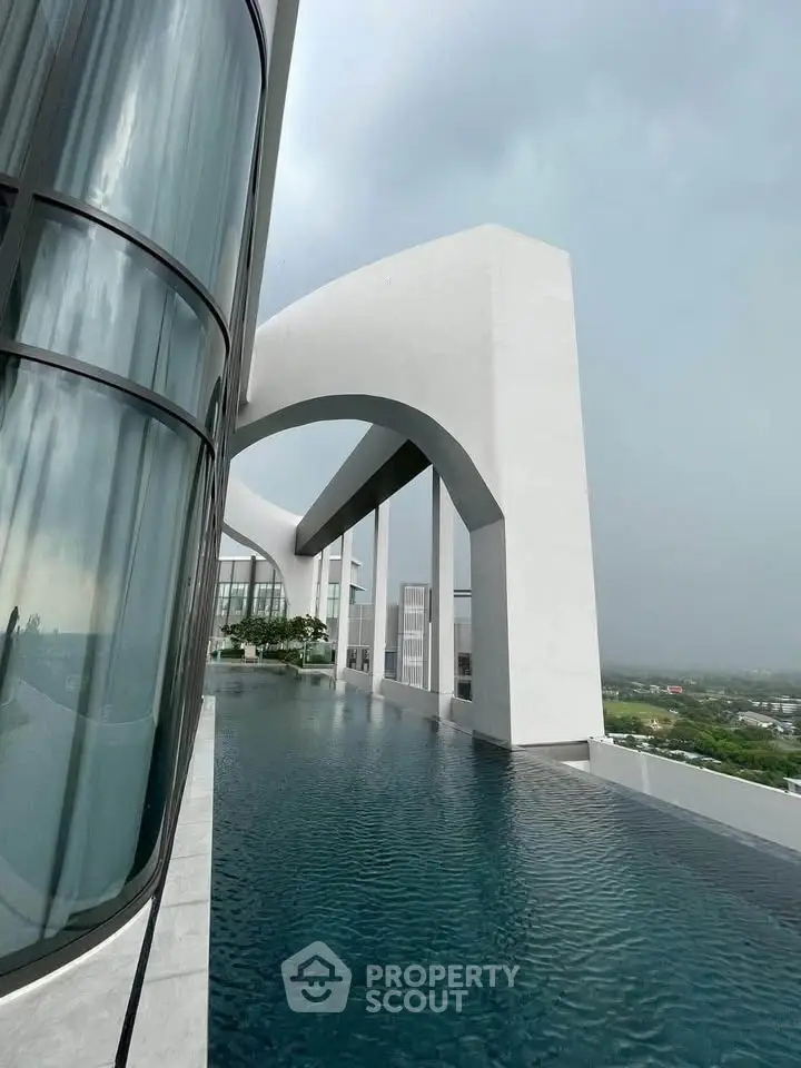 Stunning modern architectural building with infinity pool and panoramic views.