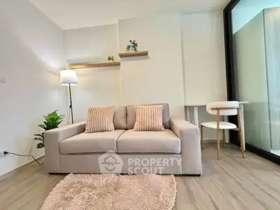 Modern living room with cozy sofa and stylish decor