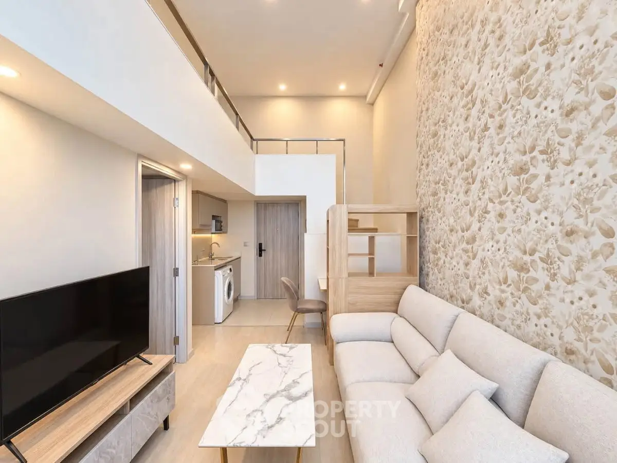 Modern duplex living room with high ceiling and elegant decor