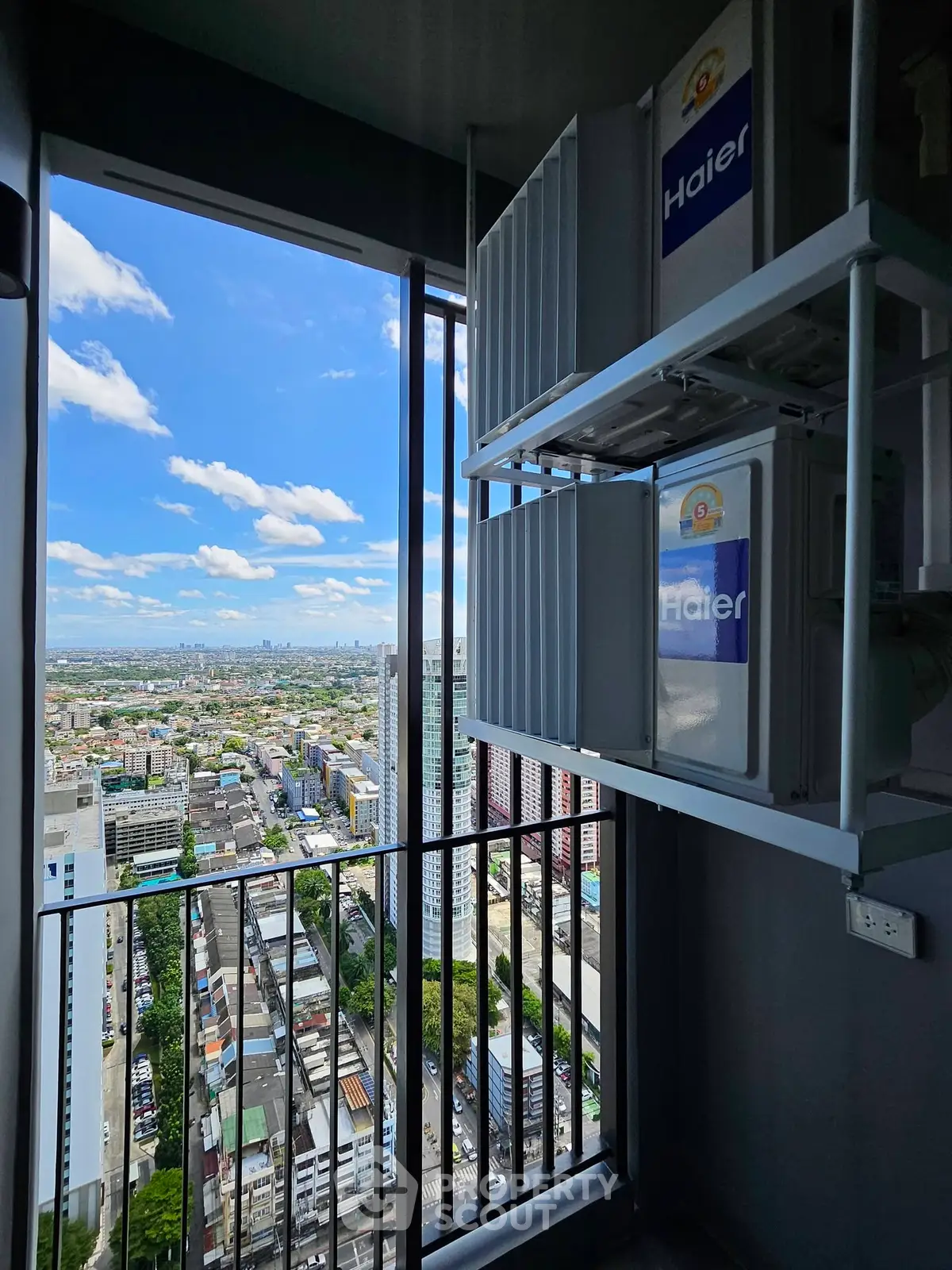 Stunning high-rise apartment with panoramic city view and modern appliances.