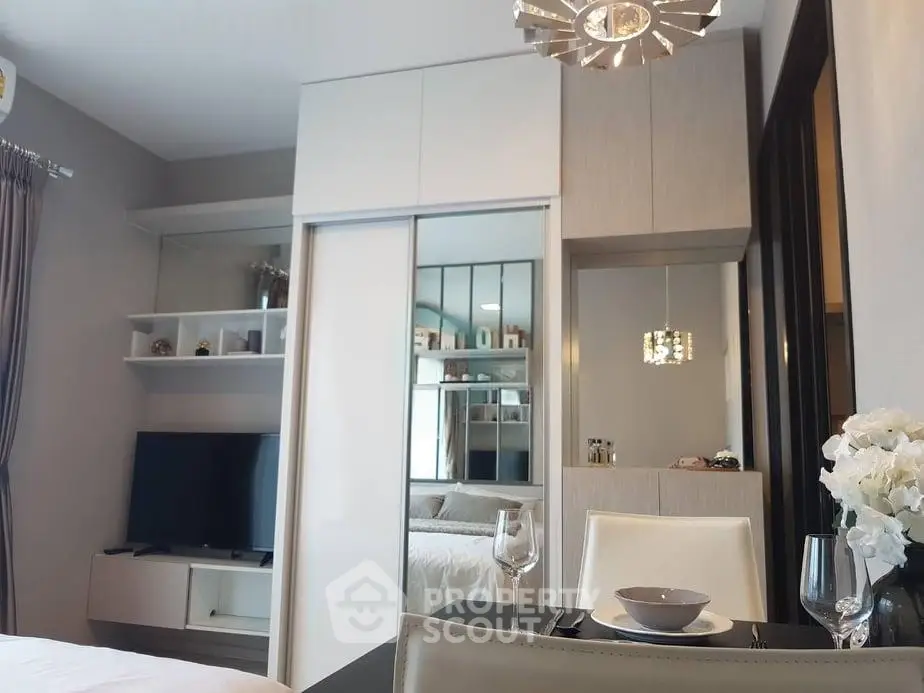 Modern living room with sleek furniture and stylish decor in a contemporary apartment.