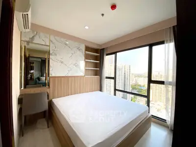 Modern bedroom with city view and stylish decor
