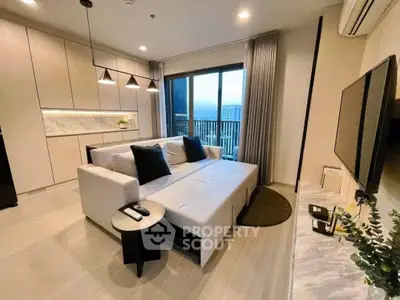 Modern living room with stylish decor and large window view