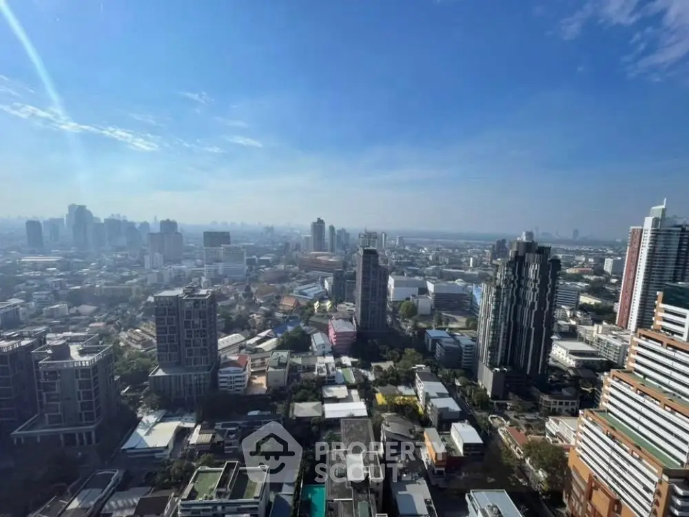 Stunning cityscape view from high-rise building showcasing urban skyline and architecture.