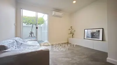 Modern living room with minimalist decor and natural light