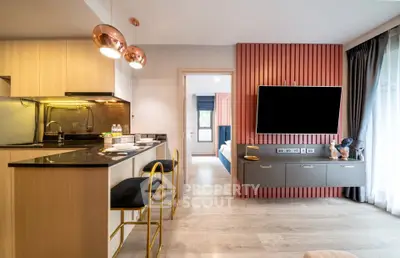 Modern open-plan living room with stylish kitchen and elegant decor