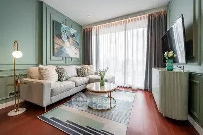 Elegant living room with modern decor, large window, and stylish furniture in a luxurious apartment.
